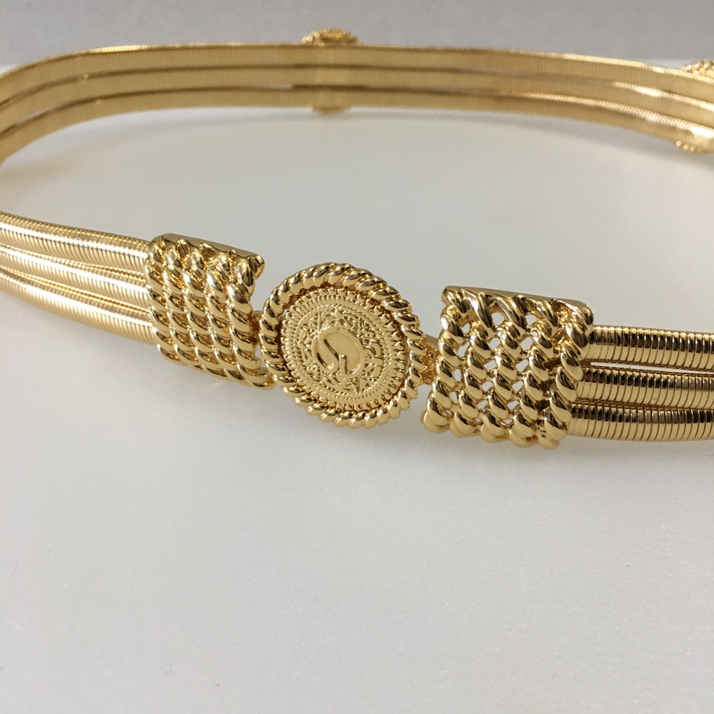 Vintage ST JOHN Gold Medallion Crest Metal belt